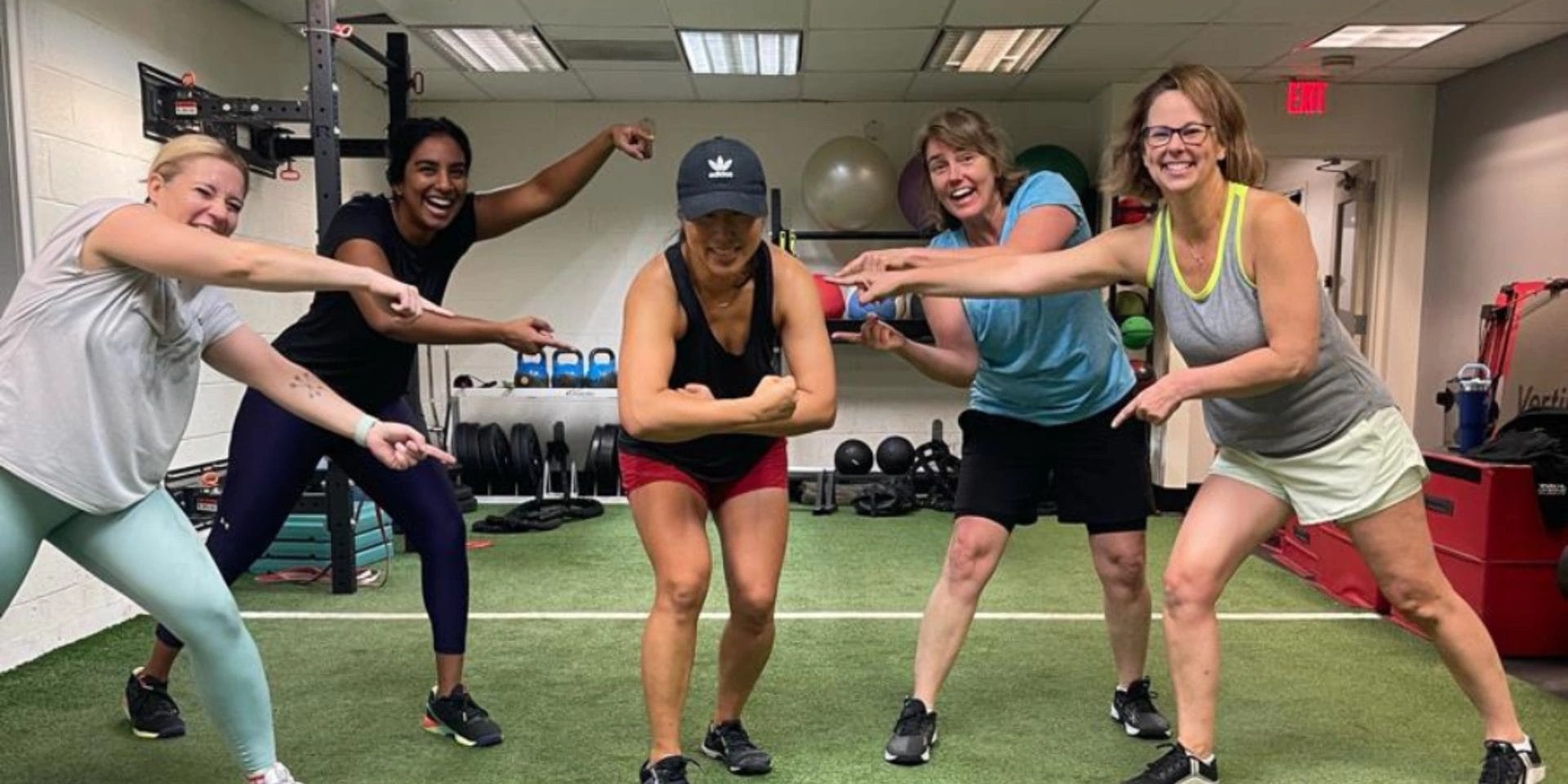 Underground Athlete Woman Flexing Muscles